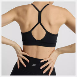 New Balance Essential Yoga Bra. black